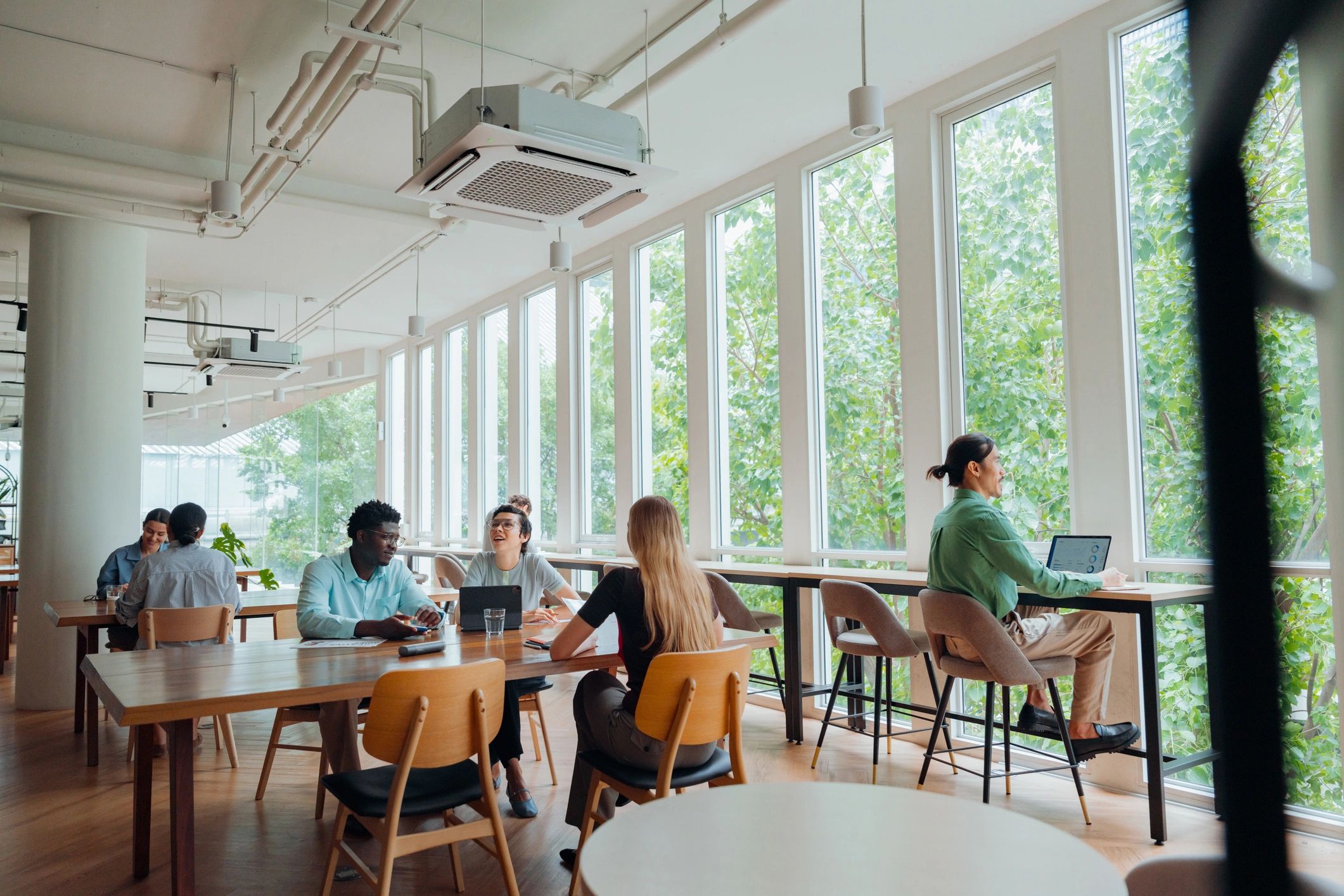Creative agency team collaborating in a modern workspace