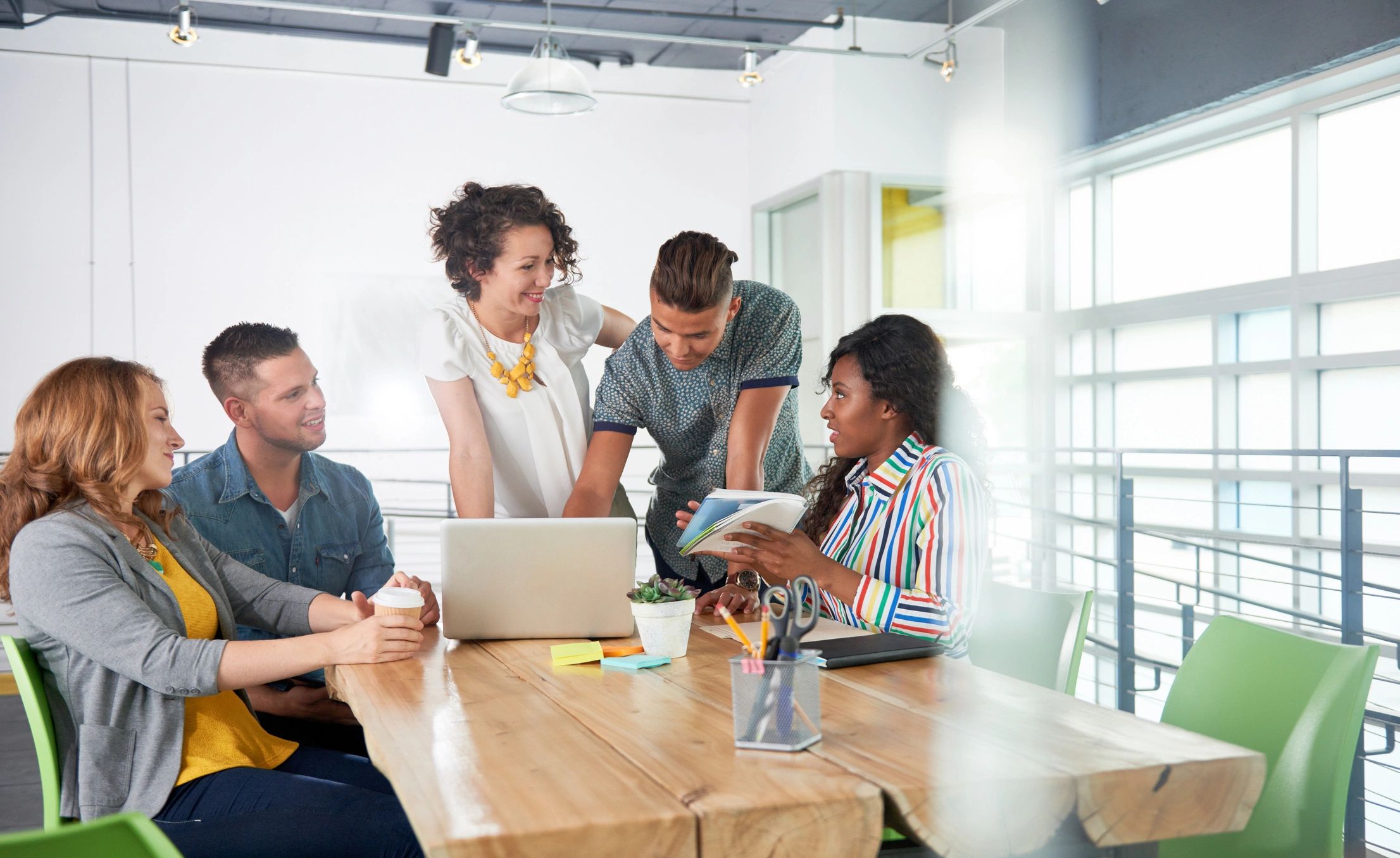 Creative professionals discussing a project